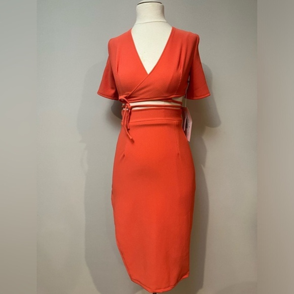 TIFFANYSLABEL ORANGE TIE UP TOP AND SKIRT SET W/ SIDE SLIT ON RIGHT SIDE